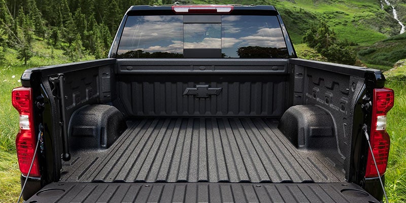 Chevrolet Silverado 1500 truck bed, showcasing the spacious and durable cargo area.